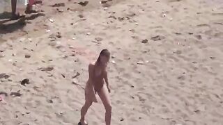 A couple enjoys intimacy without any clothes on the sea
