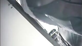 A girl was paying at the shop and was secretly filming
