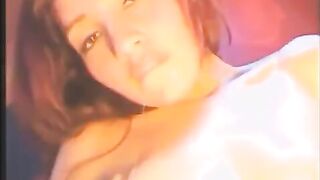 A young girl has sex with a vibrator in all holes