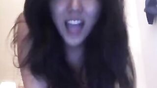 An Asian girl who loves to masturbate on her bed and share it all