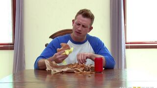 A wife, not bored, fucks herself with a cucumber in the kitchen