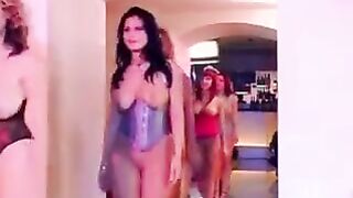 Busty woman fucked by a crowd of men