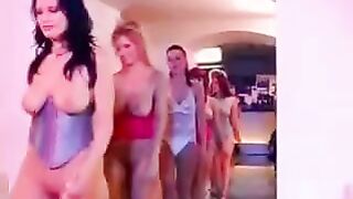 Busty woman fucked by a crowd of men