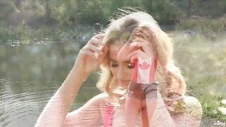 The tender masturbation of a blonde on the lake in HD quality