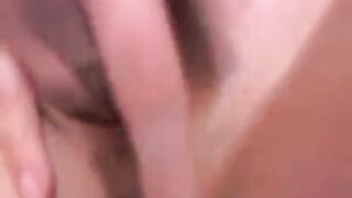 A Russian camwhore with small boobs plays with her pussy on a webcam