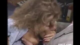 A hot teacher with big boobs is touching a schoolgirl in a private way