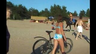 A couple has sex on the beach without any covers