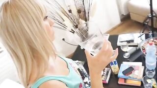A busty blonde teen gets her big boobs wet and sloppy