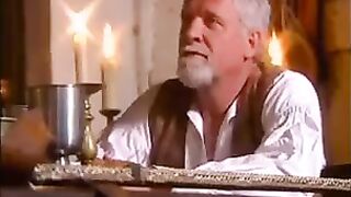 A woman is having sex with men in a medieval style in the forest