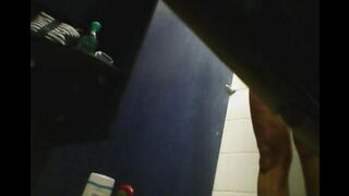 There is a camera in the shower and it captures a girl without clothes