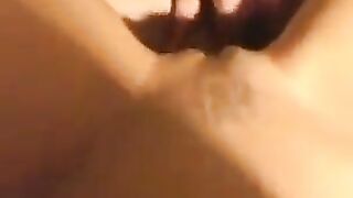A beautiful, thin woman has sex on the bed in a homemade video