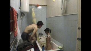 A hot sister has sex with her brother in the bathroom, hidden from others