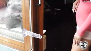A sexy girl plays with a dump truck in her room