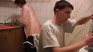 A hot mom gets fucked in the kitchen, it's quite a view