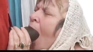 A huge black cock fucks a grandma with big tits