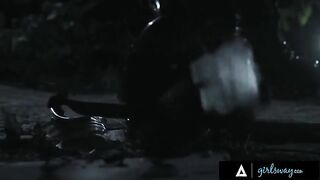In a post-apocalyptic world, a huntress seeks survivors, finding a busty duo in a desperate gamble