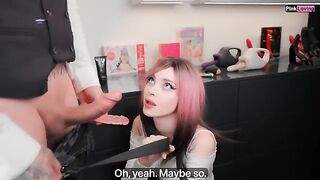 A sweet girl is choosing new toys in the shop together with her husband