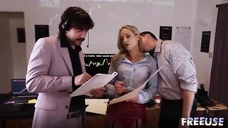 A girl in a suit seduces traders with her body in the office
