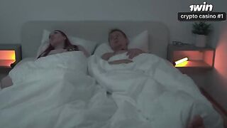 A couple has a heated encounter in bed, sharing intense moments