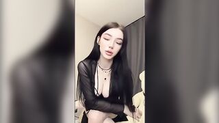 The guy groans through clenched teeth as the goth girl takes control