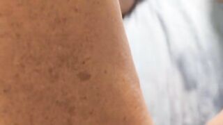 A woman has her own orgasm with her fingers and tongue