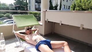 The beautiful girl gives a blowjob on the balcony of her luxurious villa